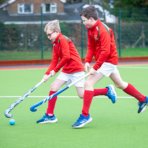 Students playing hockey