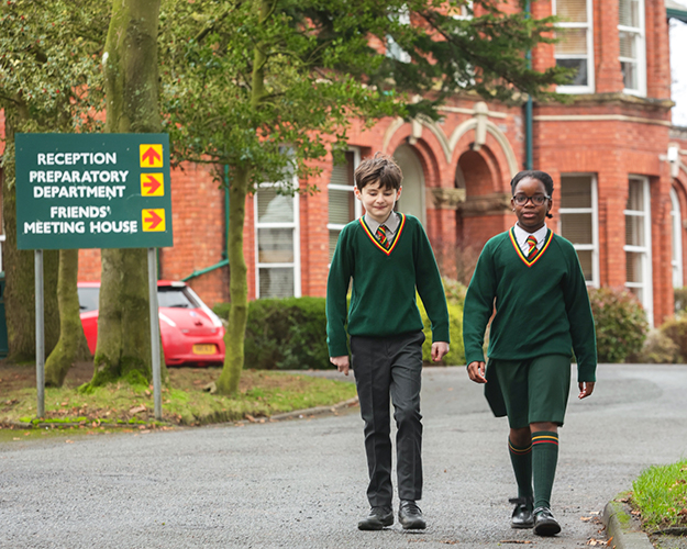 Students walking outside school building